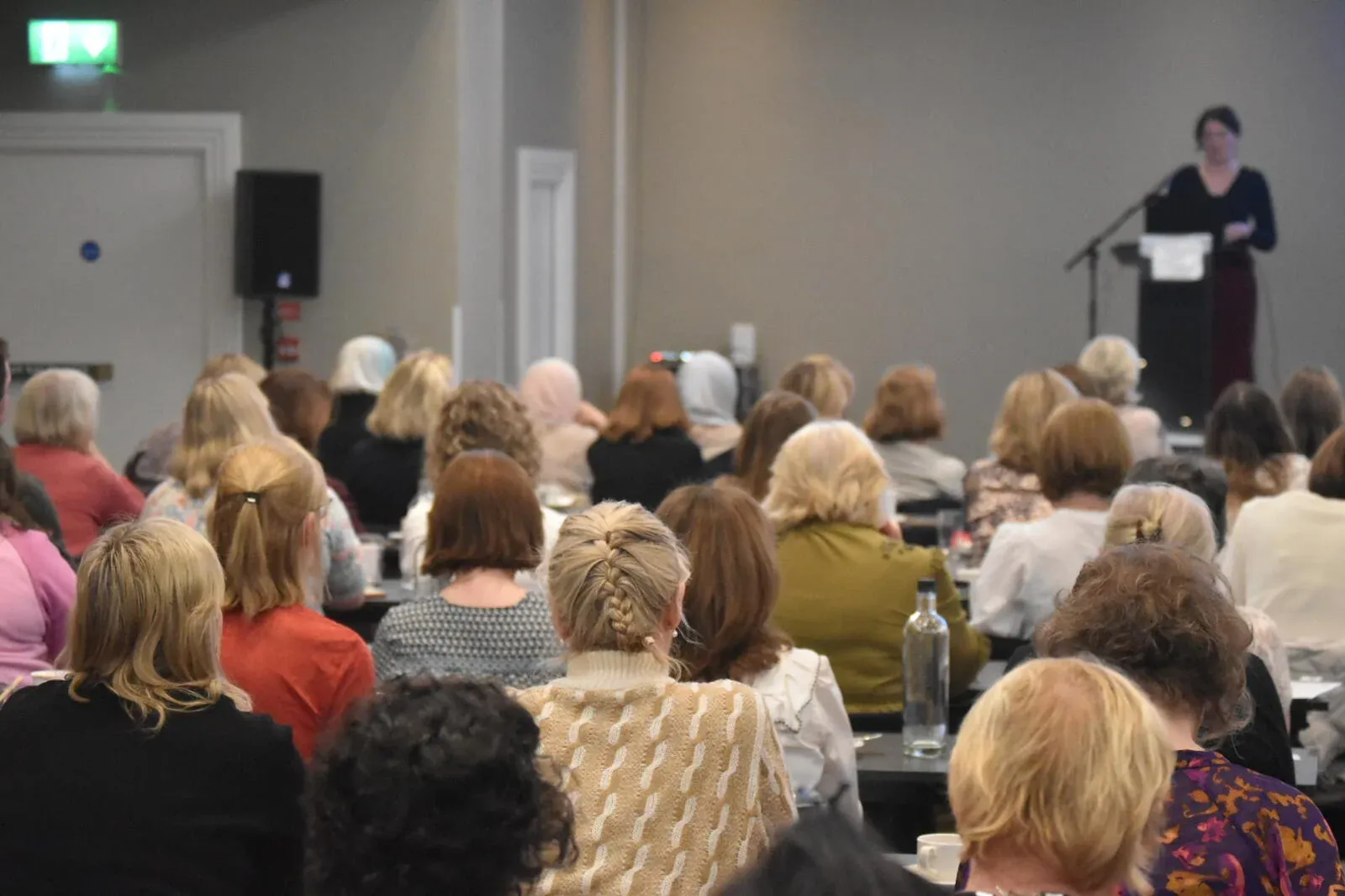 A speaker addressing a full room at an Annual Scientific Meeting