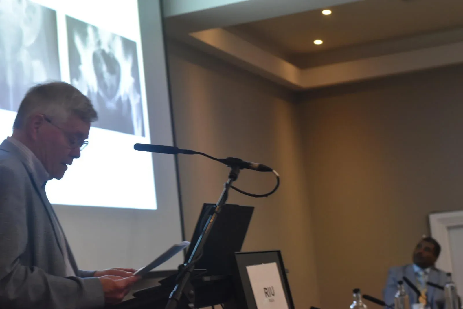 A speaker presenting at the Annual Scientific Meeting
